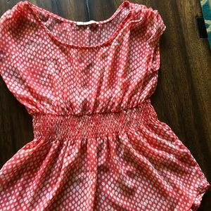 Peplum top. NWOT. Medium. Tangerine/Cream color
